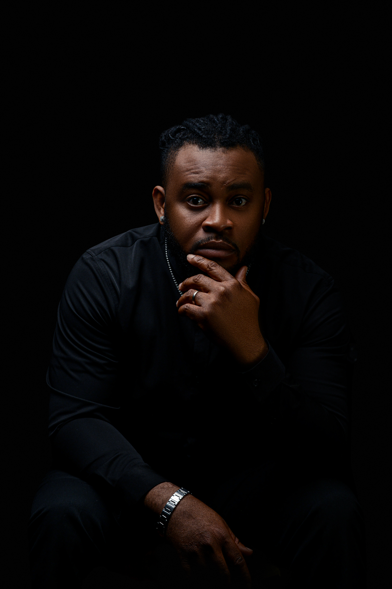 Professional studio portrait with dramatic lighting