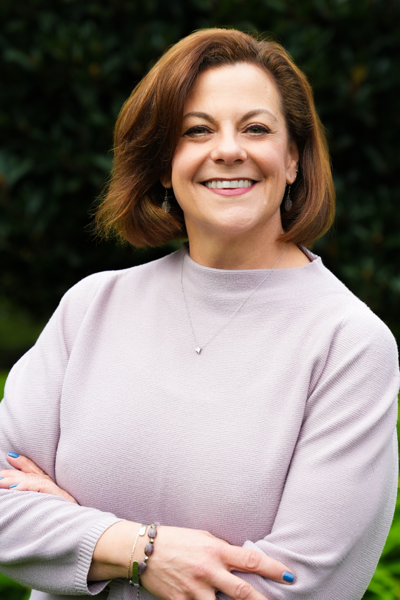 Corporate headshot with natural outdoor background