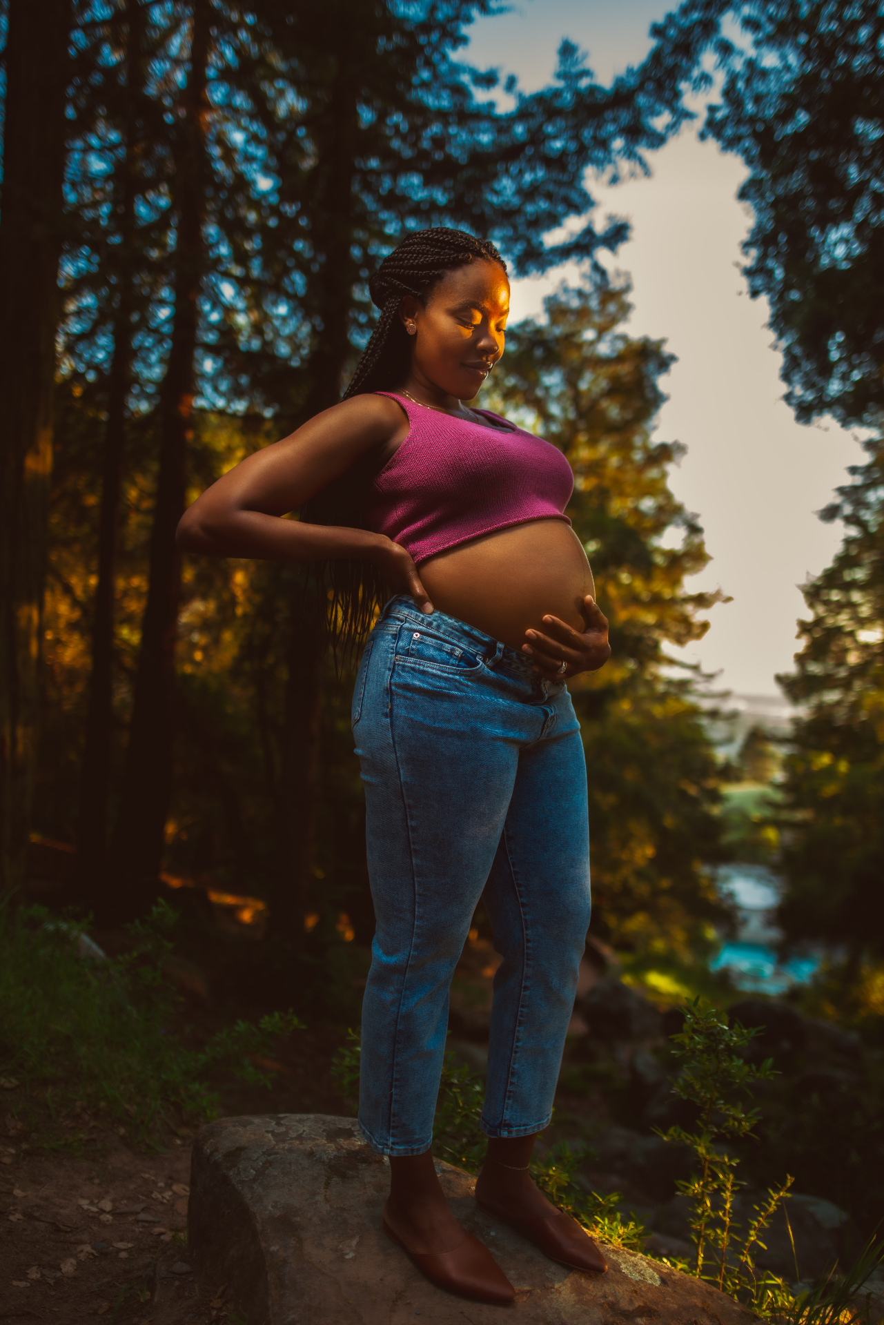 Maternity outdoor portrait with golden hour lighting